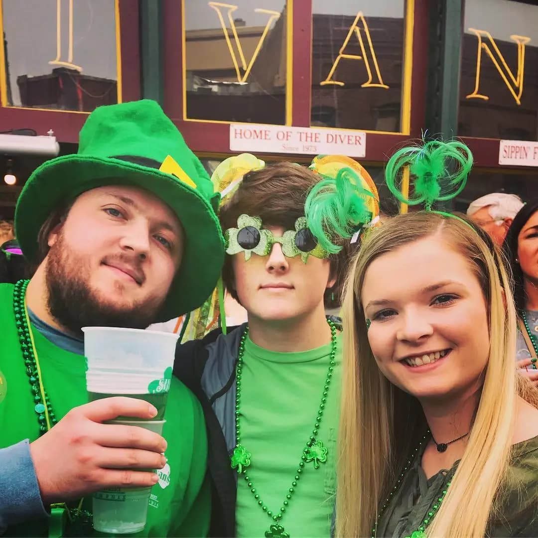 Hunter and his younger brother and sister at the St. Patrick's Day parade on Beale Street